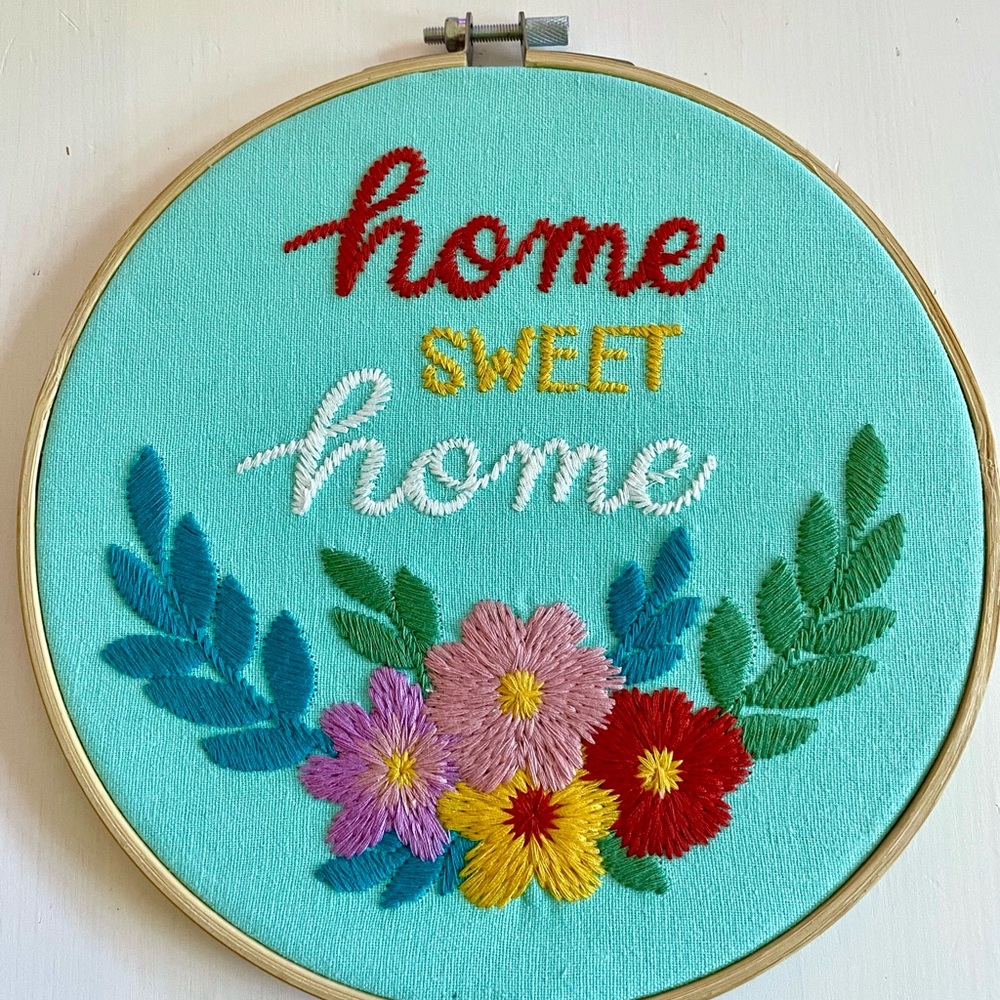 Embroidered sign